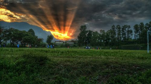 sunset,view,stop,raining,students,playing,football,pokhara,university,ground