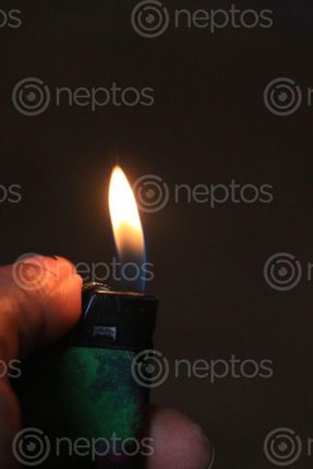 Find  the Image hand,lighter,dark,night#,sms,photography  and other Royalty Free Stock Images of Nepal in the Neptos collection.