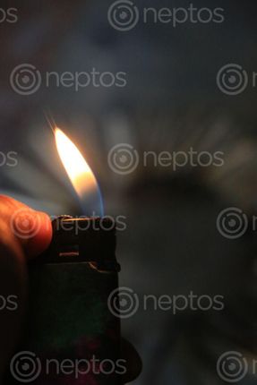 Find  the Image hand,lighter,dark,night#,sms,photography  and other Royalty Free Stock Images of Nepal in the Neptos collection.