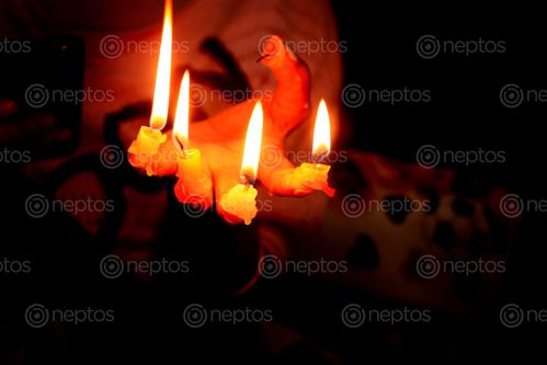 Find  the Image candle,finger#,burn#,stock,image#,nepal,_photographyby,sita,maya,shrestha  and other Royalty Free Stock Images of Nepal in the Neptos collection.