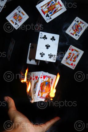 Find  the Image burning,play,cards#,stock,image,nepalphotography,sita,maya,shrestha  and other Royalty Free Stock Images of Nepal in the Neptos collection.