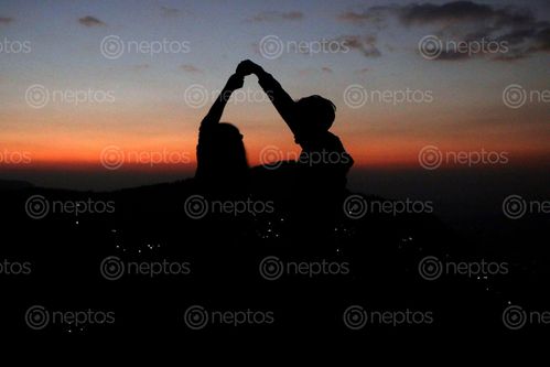 Find  the Image couple,sunset,picture,#romance#sindhupalchok#tauthali,#stockimage#,nepal,photography,sita,maya,shrestha  and other Royalty Free Stock Images of Nepal in the Neptos collection.